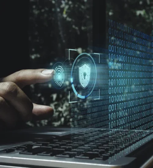 security-data-screen-with-man-pointing-finger-laptop-computer-scaled