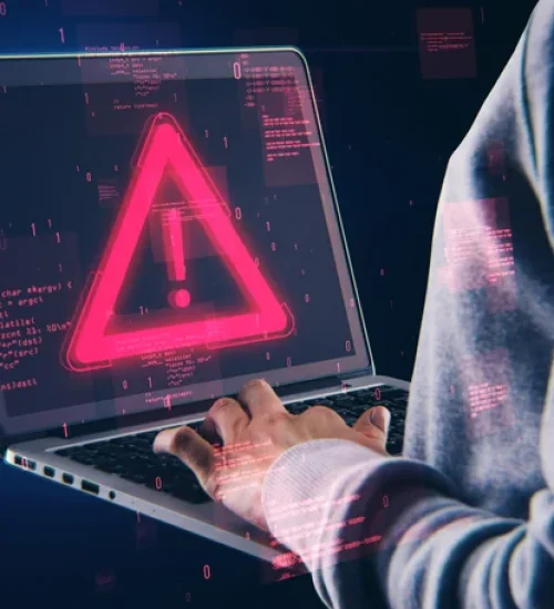 warning-exclamation-mark-laptop-screen-surrounded-by-digital-code-dark-background-alert-concept-scaled-1
